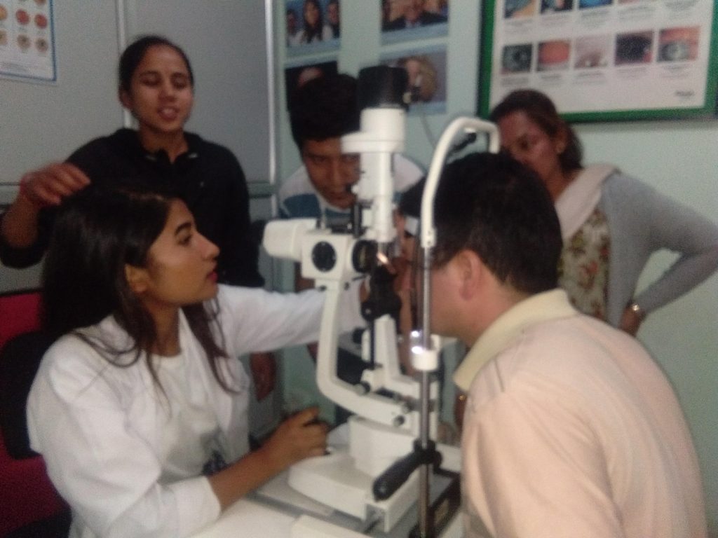 Children receiving eye check-ups